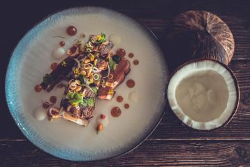 Nuea Kim Sot-Salted beef ribs braised in coconut cream accompanied with fresh mint, coriander and lemongrass