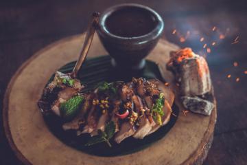 Moo Yang - BBQ Chang Mai black pork chop with nham jim jeaw and tamarind relish