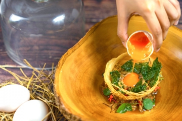 Phed Krakoa Mi Krob - a 12-hour slow-cooked duck leg with anise smoke, and sous vide duck egg drizzle