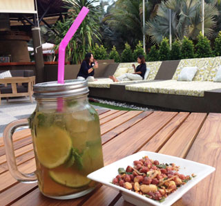 Cocktail in a mason jar & a snack. Enjoy!