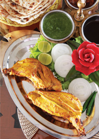 Tandoori chicken fresh out of the tandoor