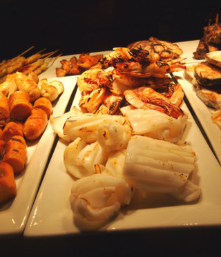 A selection of meats & seafood at a sunset buffet
